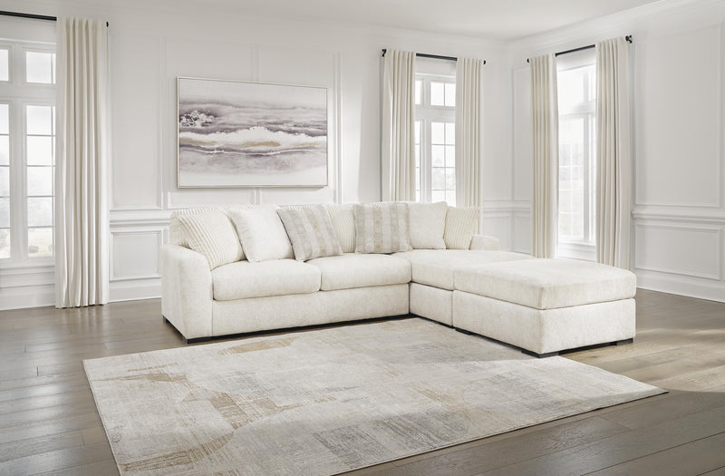 Ashley Furniture Chessington living room set featuring a sofa, armchair, and coordinating coffee table in a modern design.