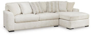 Ashley Furniture Chessington living room set with sofa, loveseat, and coffee table in a modern design.