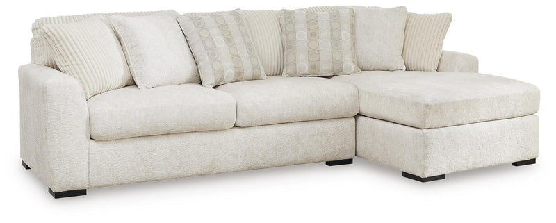 Ashley Furniture Chessington living room set with sofa, loveseat, and coffee table in a modern design.