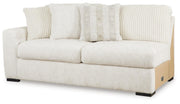 Ashley Furniture Chessington Living Room Set with sofa and armchair, featuring neutral upholstery and modern design.