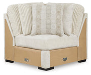 Ashley Furniture Chessington sectional sofa with plush cushions and a modern design, shown head-on in the image.