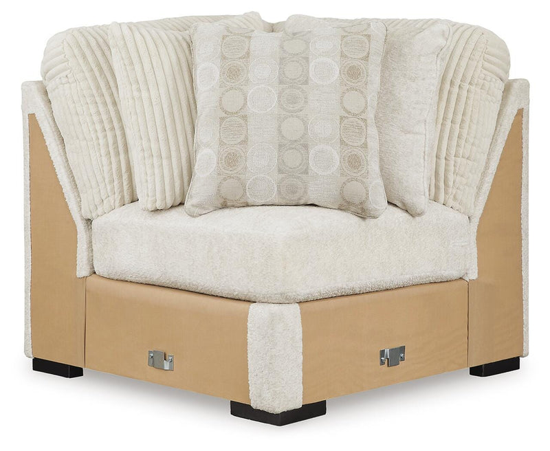 Ashley Furniture Chessington sectional sofa with plush cushions and a modern design, shown head-on in the image.