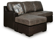 Ashley Furniture Castille Way sectional with chaise, featuring plush upholstery and a modern design, viewed from an angled perspective.