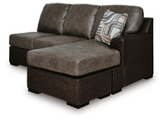 Ashley Furniture Castille Way sectional with chaise, shown from an angled view, featuring plush cushions and stylish design.