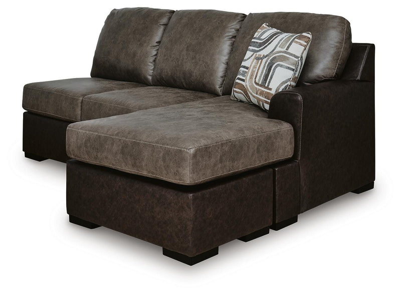 Ashley Furniture Castille Way sectional with chaise, shown from an angled view, featuring plush cushions and stylish design.