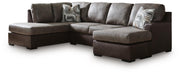 Ashley Furniture Castille Way sectional with chaise, showing the modern fabric sofa with a spacious chaise lounge.