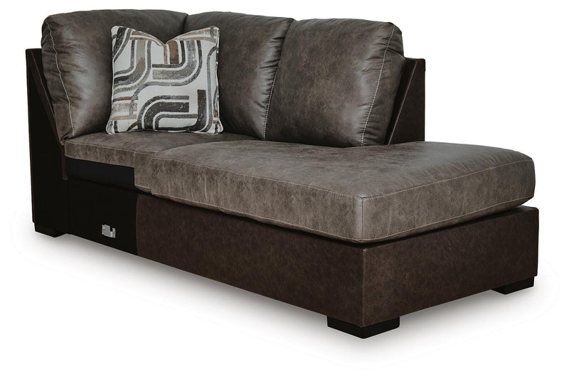 Ashley Furniture Castille Way sleeper sectional with chaise, featuring a contemporary fabric design and plush cushions, shown from an angle.