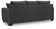 Ashley Furniture Loreo sofa with plush back cushions and modern design, shown from the back view in the image.