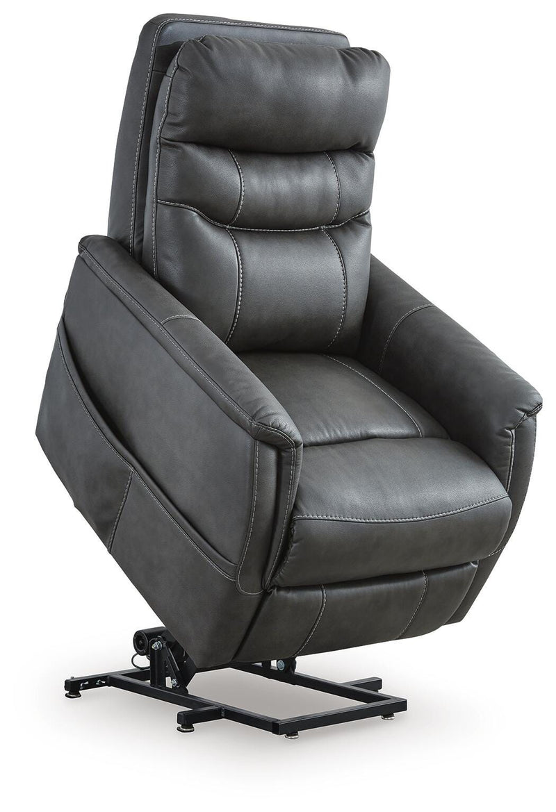 Ashley Furniture Strawbill Power Lift Recliner in beige with plush cushioning and wooden base, shown from an angled view.