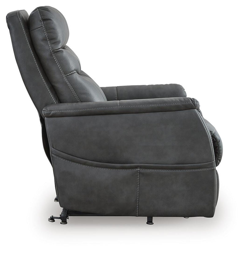 Ashley Furniture Strawbill Power Lift Recliner in brown fabric with plush cushioning and side control panel.