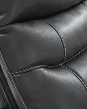 Ashley Furniture Strawbill Power Lift Recliner with stitched detail, featuring plush cushioning and a supportive reclining design.