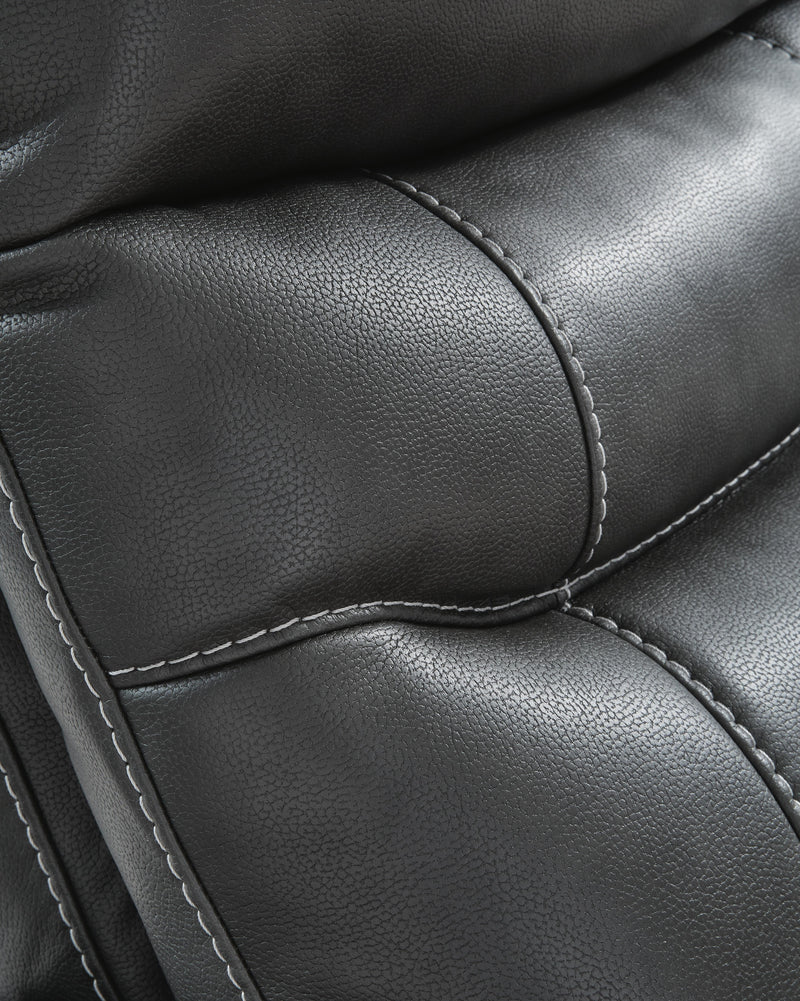 Ashley Furniture Strawbill Power Lift Recliner with stitched detail, featuring plush cushioning and a supportive reclining design.