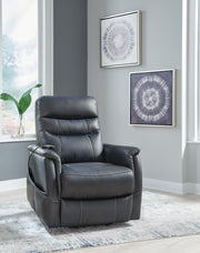 Ashley Furniture Strawbill Power Lift Recliner, closed view showing padded armrests and plush upholstery in a cozy living room setting.