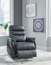 Ashley Furniture Strawbill Power Lift Recliner in plush fabric, shown in an open position with padded armrests and a high back.