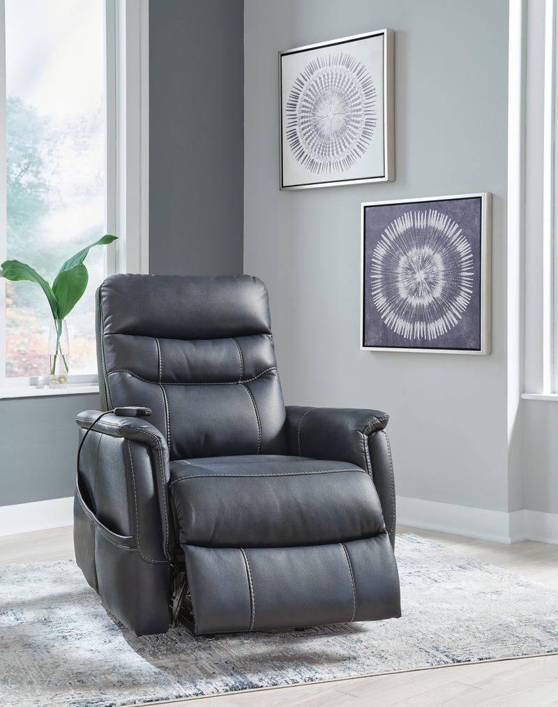 Ashley Furniture Strawbill Power Lift Recliner in plush fabric, shown in an open position with padded armrests and a high back.