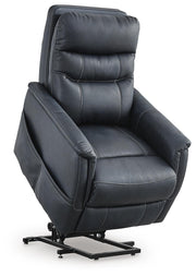 Ashley Furniture Strawbill Power Lift Recliner in tan fabric, showing the reclined position with armrests and plush cushioning.
