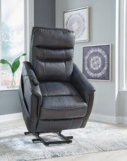 Ashley Furniture Strawbill Power Lift Recliner in beige fabric, showing the reclined position from an upward angle.