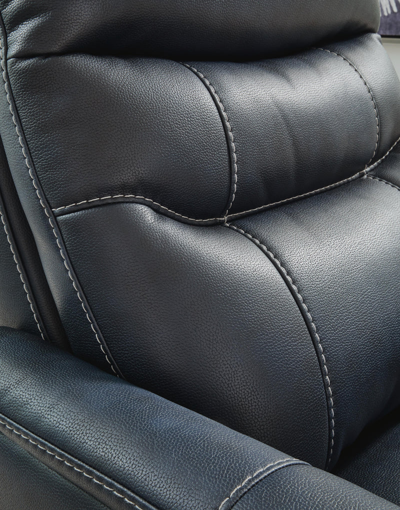 Ashley Furniture Strawbill Power Lift Recliner with stitched detailing, padded armrests, and plush upholstery for comfort.