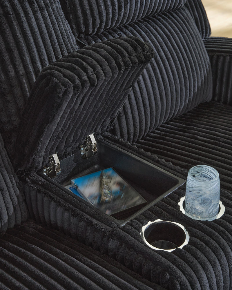 Ashley Furniture Forest Lake power reclining loveseat with console, featuring plush upholstery and built-in cup holders.