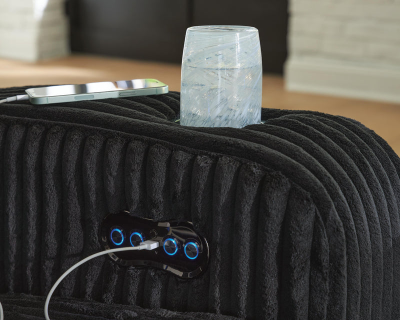Ashley Furniture Forest Lake power reclining loveseat with built-in console, USB ports, and plush cushioned seating.