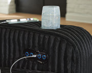Ashley Furniture Forest Lake Power Reclining Sofa with USB ports, plush fabric, and cup holder armrests, showing detailed close-up.