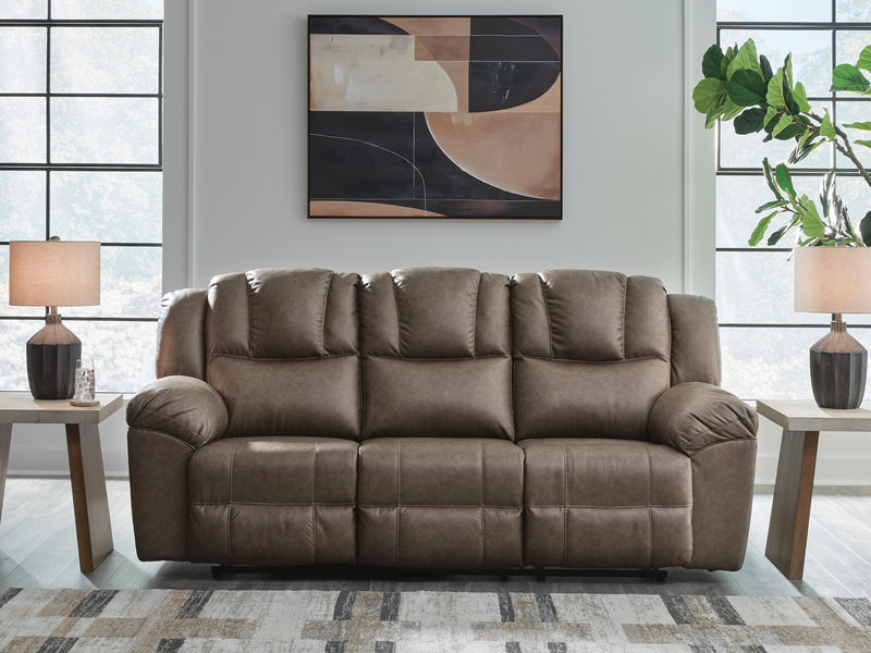 Ashley Furniture Lowilla living room set featuring a stylish sofa and armchair with neutral fabric upholstery.