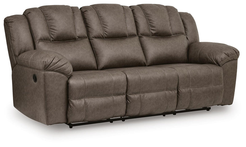 Ashley Furniture Lowilla living room set with sofa and armchair, showcasing plush cushions and modern design from an angled view.