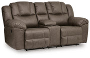 Ashley Furniture Lowilla living room set with sofa and armchair, featuring plush cushions and modern design in a cozy living space.