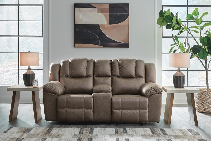 Ashley Furniture Lowilla living room set with a sofa and armchair in a modern design, featuring neutral upholstery and wooden legs.