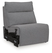 Ashley Furniture Modmax reclining sectional with built-in audio console, showing plush fabric, reclining seats, and integrated sound system.