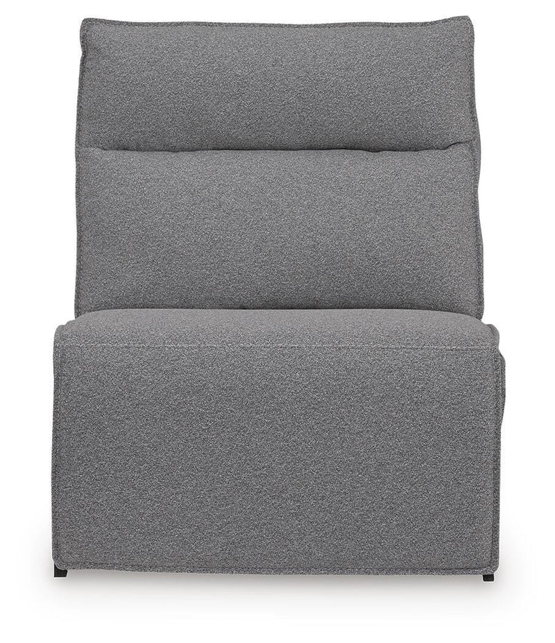 Ashley Furniture Modmax reclining sectional with integrated audio console, featuring plush cushions and modern sectional design.