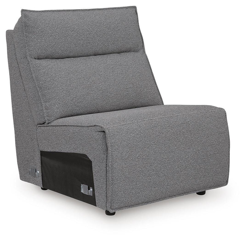 Ashley Furniture Modmax reclining sectional with built-in audio console shown from an angle, featuring plush cushions and modern design.