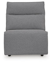Ashley Furniture Modmax II power reclining sectional with built-in audio consoles, featuring plush cushions and modern design.