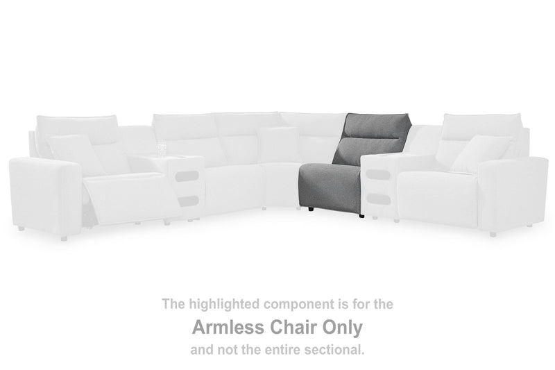 Ashley Furniture Modmax II power reclining sectional with built-in audio consoles, featuring plush cushions and modern design.
