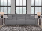 Ashley Furniture Modmax power reclining sectional with plush cushions and modern design, shown in a cozy living room setting.