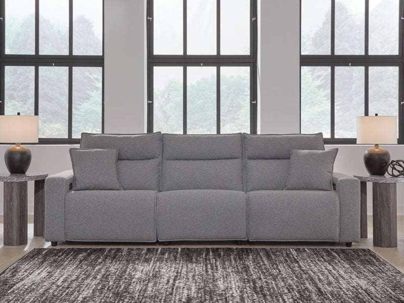 Ashley Furniture Modmax power reclining sectional with plush cushions and modern design, shown in a cozy living room setting.
