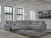 Ashley Furniture Modmax reclining sectional with built-in console, featuring plush cushions and modern design in a neutral fabric.