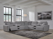 Ashley Furniture Modmax II power reclining sectional with built-in audio consoles, featuring plush cushions and modern design.
