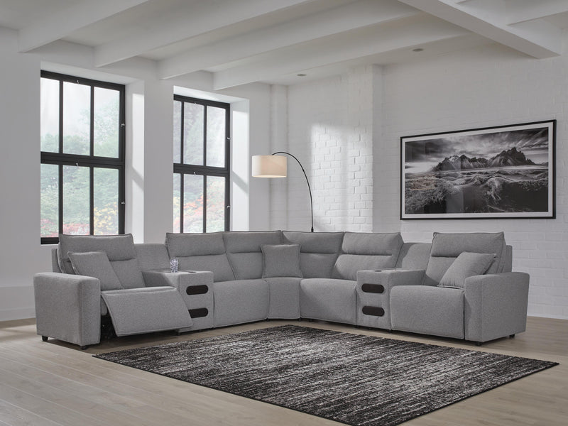 Ashley Furniture Modmax II power reclining sectional with built-in audio consoles, featuring plush cushions and modern design.