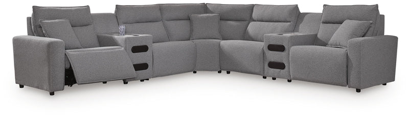 Ashley Furniture Modmax II power reclining sectional with integrated audio consoles, featuring plush cushions and modern design.