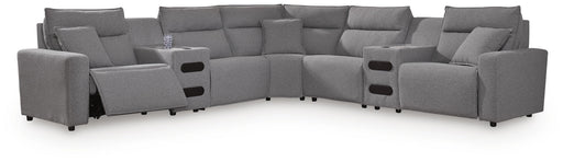 Ashley Furniture Modmax II power reclining sectional with integrated audio consoles, featuring plush cushions and modern design.