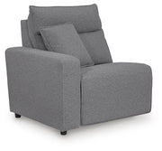 Ashley Furniture Modmax II power reclining sectional with built-in audio consoles, shown from an angled side view.