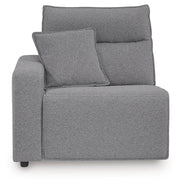 Ashley Furniture Modmax reclining sectional with built-in audio console, showcasing plush cushions and modern design.