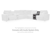 Ashley Furniture Modmax reclining sectional with integrated audio console, featuring plush cushions and modern design in a living room setting.