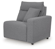 Ashley Furniture Modmax reclining sectional with built-in audio console, featuring plush cushions and modern design in a living room setting.