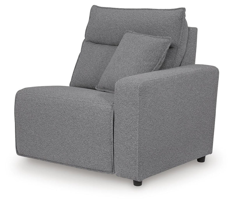 Angle view of Ashley Furniture Modmax II Power Reclining Sectional with built-in audio consoles and plush cushions.