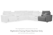 Ashley Furniture Modmax II Power Reclining Sectional with integrated audio consoles, featuring plush cushions and modern design.