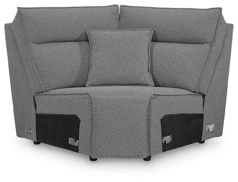 Ashley Furniture Modmax II power reclining sectional with built-in audio consoles, shown from a front head-on view.