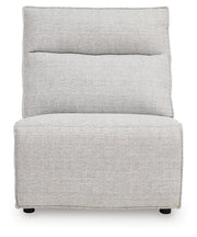 Ashley Furniture Modmax II reclining sectional sofa with chaise, featuring plush cushions and a modern design, seen from the front.
