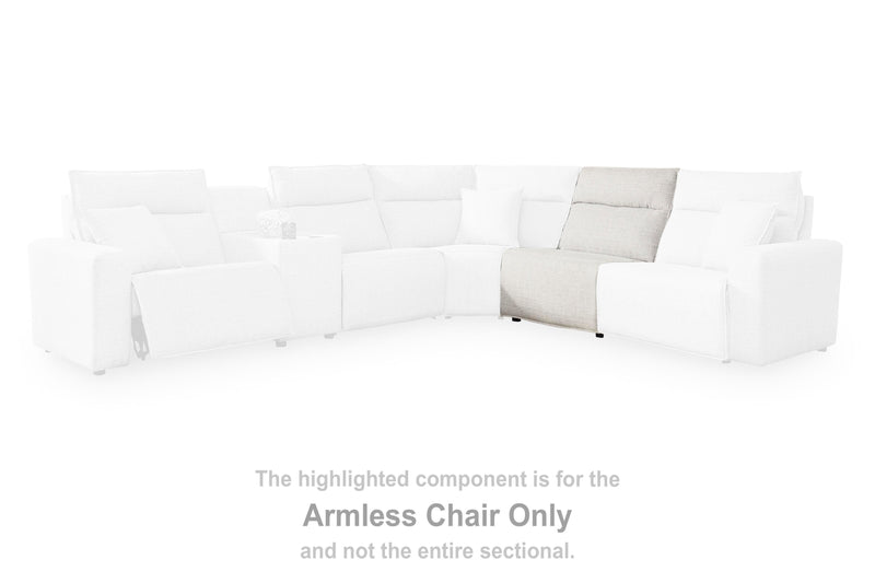 Ashley Furniture Modmax II Reclining Sofa Chaise sectional with plush upholstery and reclining features, shown in a modern living room setting.